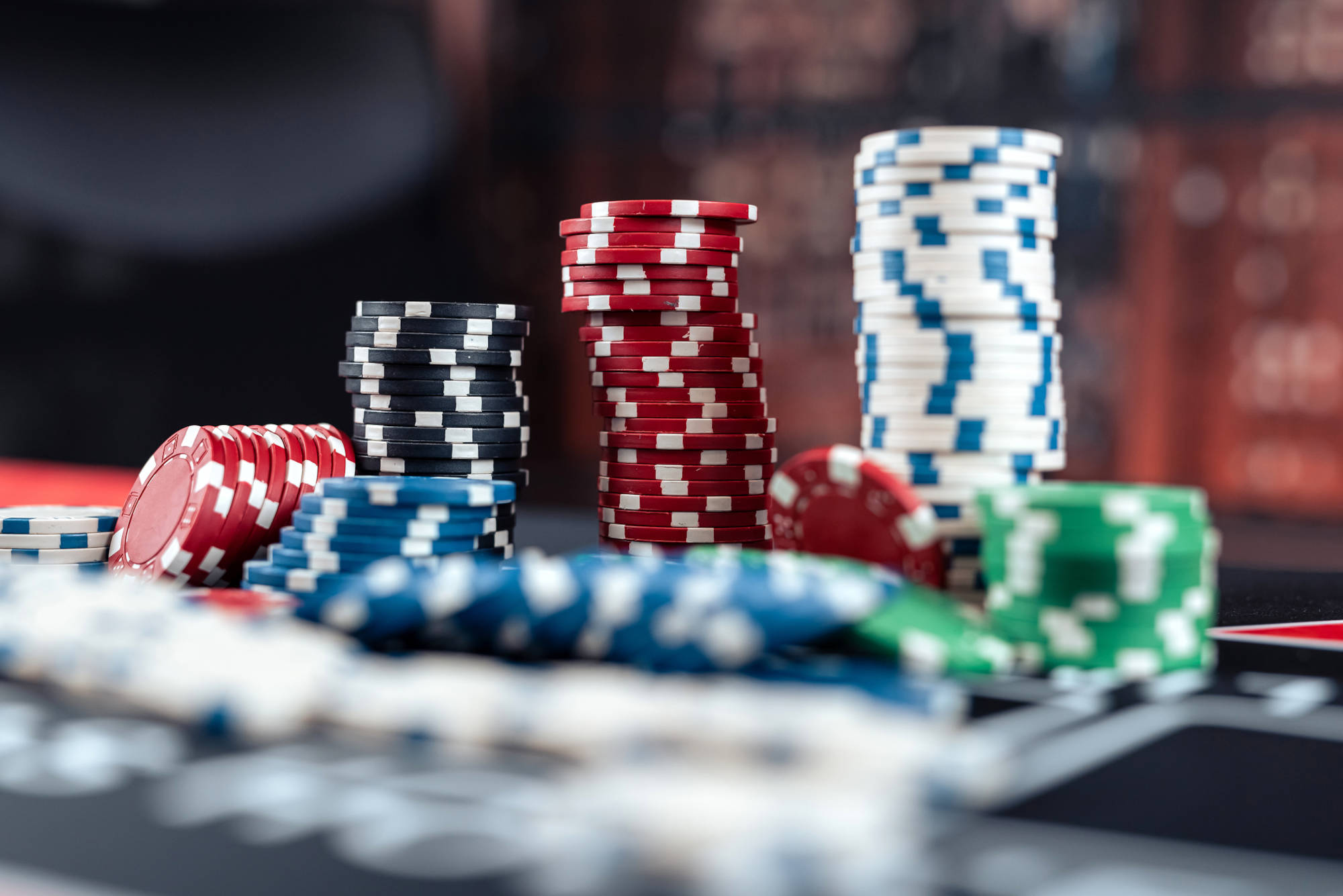 Concept of poker game card with chips on desk